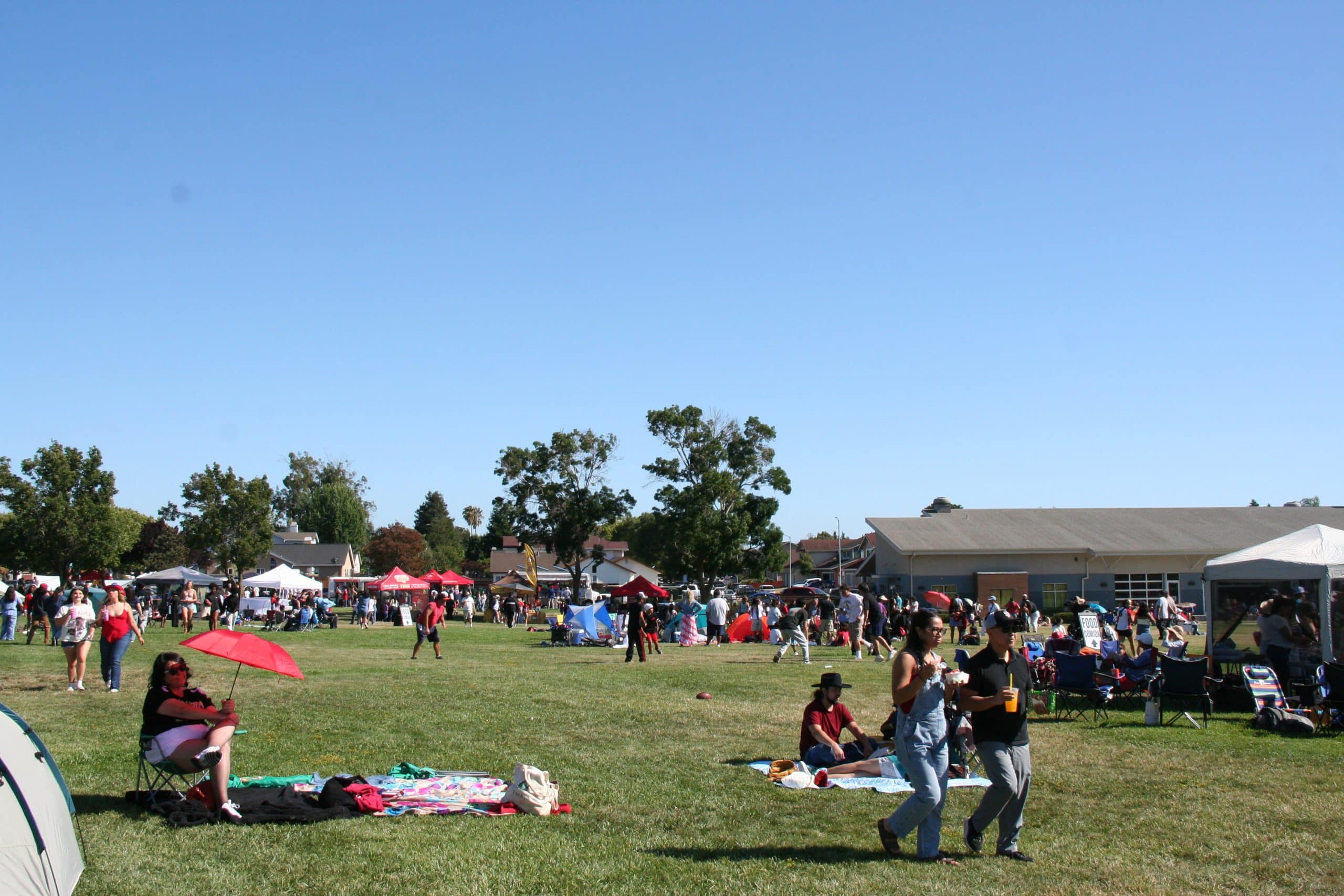 Crowd entering Community Park II as the parade finishes up. Xavey Bzdek photo